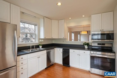 Impeccable end-unit in popular and ultra-convenient River Run on Meadowcreek Golf Course in Virginia - for sale on GolfHomes.com, golf home, golf lot