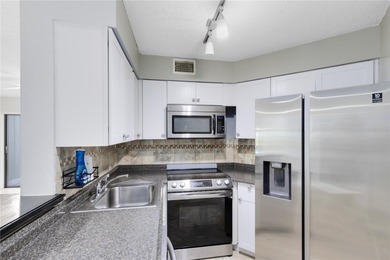 Welcome to this first-floor 2-bedroom, 2-bath condo located in a on Ventura Country Club in Florida - for sale on GolfHomes.com, golf home, golf lot