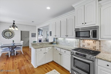 Welcome home to this charming 3-bedroom, 2-bath residence in the on Lake Caroline Golf Club in Mississippi - for sale on GolfHomes.com, golf home, golf lot