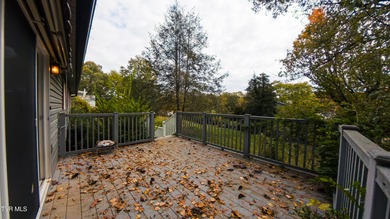 This spacious 4-bedroom, 3-bath home offers incredible potential on Country Club of Bristol in Tennessee - for sale on GolfHomes.com, golf home, golf lot