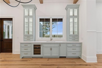 Immerse yourself in breathtaking marshfront living with this on Frederica Golf Club in Georgia - for sale on GolfHomes.com, golf home, golf lot