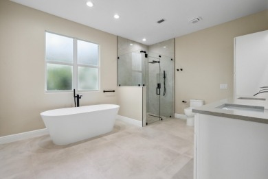 Exceptional FULLY renovated 3BR/2.5BA lakefront home in the on The Legacy Golf and Tennis Club in Florida - for sale on GolfHomes.com, golf home, golf lot