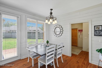 Welcome home to this charming 3-bedroom, 2-bath residence in the on Lake Caroline Golf Club in Mississippi - for sale on GolfHomes.com, golf home, golf lot