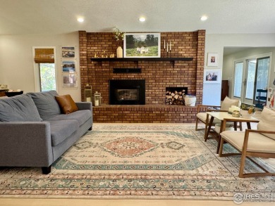Surrounded by 40 trees, and nestled in a spacious, desirable on Pawnee Pines Golf Club in Colorado - for sale on GolfHomes.com, golf home, golf lot