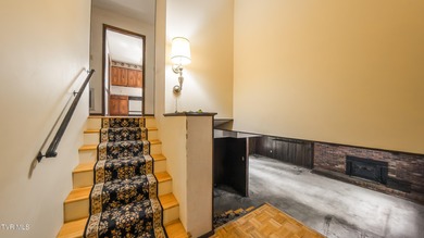 This spacious 4-bedroom, 3-bath home offers incredible potential on Country Club of Bristol in Tennessee - for sale on GolfHomes.com, golf home, golf lot