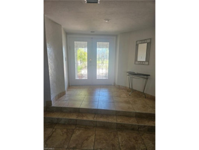 Welcome to your luxury waterfront oasis in Cape Coral! This on Royal Tee Country Club in Florida - for sale on GolfHomes.com, golf home, golf lot