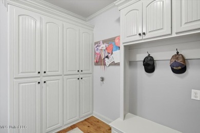 Welcome home to this charming 3-bedroom, 2-bath residence in the on Lake Caroline Golf Club in Mississippi - for sale on GolfHomes.com, golf home, golf lot