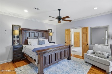 Welcome home to this charming 3-bedroom, 2-bath residence in the on Lake Caroline Golf Club in Mississippi - for sale on GolfHomes.com, golf home, golf lot