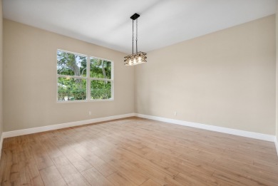 Exceptional FULLY renovated 3BR/2.5BA lakefront home in the on The Legacy Golf and Tennis Club in Florida - for sale on GolfHomes.com, golf home, golf lot