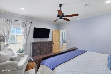Welcome home to this charming 3-bedroom, 2-bath residence in the on Lake Caroline Golf Club in Mississippi - for sale on GolfHomes.com, golf home, golf lot