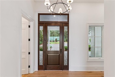 Immerse yourself in breathtaking marshfront living with this on Frederica Golf Club in Georgia - for sale on GolfHomes.com, golf home, golf lot