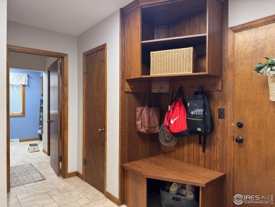 Surrounded by 40 trees, and nestled in a spacious, desirable on Pawnee Pines Golf Club in Colorado - for sale on GolfHomes.com, golf home, golf lot
