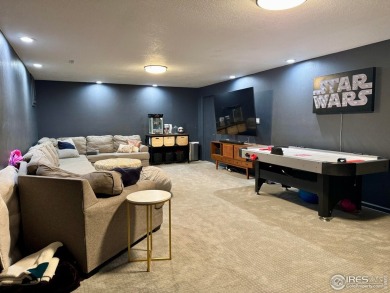 Surrounded by 40 trees, and nestled in a spacious, desirable on Pawnee Pines Golf Club in Colorado - for sale on GolfHomes.com, golf home, golf lot