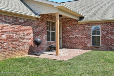 Welcome home to this charming 3-bedroom, 2-bath residence in the on Lake Caroline Golf Club in Mississippi - for sale on GolfHomes.com, golf home, golf lot