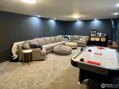 Surrounded by 40 trees, and nestled in a spacious, desirable on Pawnee Pines Golf Club in Colorado - for sale on GolfHomes.com, golf home, golf lot