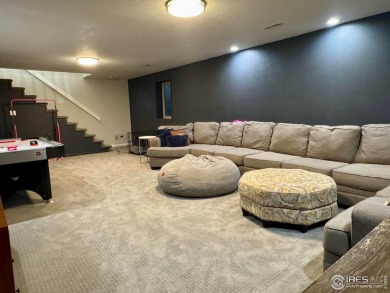 Surrounded by 40 trees, and nestled in a spacious, desirable on Pawnee Pines Golf Club in Colorado - for sale on GolfHomes.com, golf home, golf lot