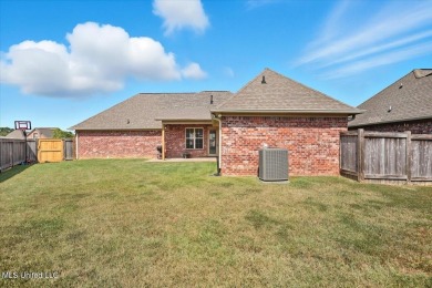 Welcome home to this charming 3-bedroom, 2-bath residence in the on Lake Caroline Golf Club in Mississippi - for sale on GolfHomes.com, golf home, golf lot