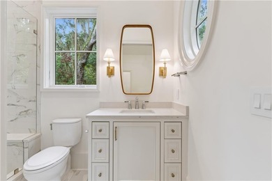 Immerse yourself in breathtaking marshfront living with this on Frederica Golf Club in Georgia - for sale on GolfHomes.com, golf home, golf lot