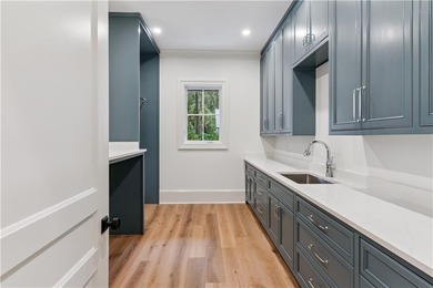 Immerse yourself in breathtaking marshfront living with this on Frederica Golf Club in Georgia - for sale on GolfHomes.com, golf home, golf lot