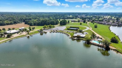 Welcome home to this charming 3-bedroom, 2-bath residence in the on Lake Caroline Golf Club in Mississippi - for sale on GolfHomes.com, golf home, golf lot