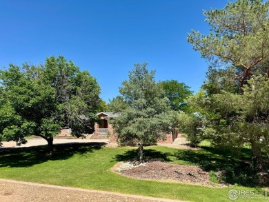 Surrounded by 40 trees, and nestled in a spacious, desirable on Pawnee Pines Golf Club in Colorado - for sale on GolfHomes.com, golf home, golf lot