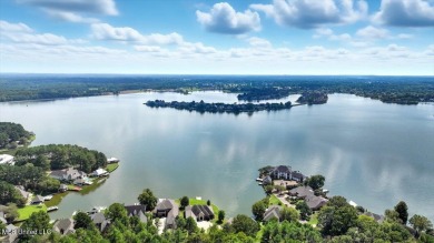 Welcome home to this charming 3-bedroom, 2-bath residence in the on Lake Caroline Golf Club in Mississippi - for sale on GolfHomes.com, golf home, golf lot