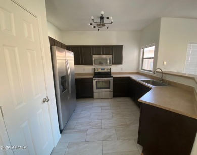 Discover this upgraded 3-bedroom, 2-bathroom condo with attached on AllGolf At Rio Salado in Arizona - for sale on GolfHomes.com, golf home, golf lot