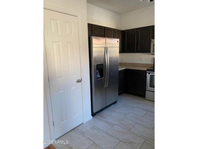 Discover this upgraded 3-bedroom, 2-bathroom condo with attached on AllGolf At Rio Salado in Arizona - for sale on GolfHomes.com, golf home, golf lot