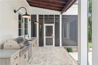 Immerse yourself in breathtaking marshfront living with this on Frederica Golf Club in Georgia - for sale on GolfHomes.com, golf home, golf lot