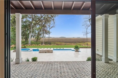 Immerse yourself in breathtaking marshfront living with this on Frederica Golf Club in Georgia - for sale on GolfHomes.com, golf home, golf lot