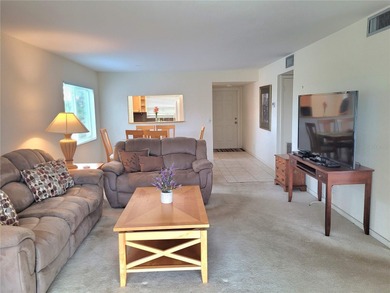 This condo sale AS IS, Welcome to easy, resort-style living in on Sunrise Lakes Phase III in Florida - for sale on GolfHomes.com, golf home, golf lot