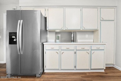 Single Level Living and no HOA in this brick, single family pool on Blue Cypress Golf Club in Florida - for sale on GolfHomes.com, golf home, golf lot