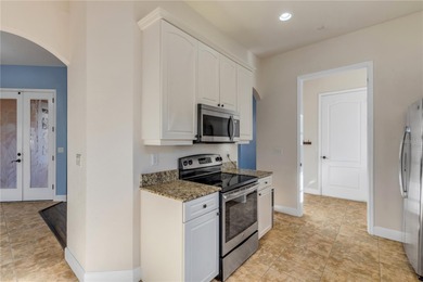 STOP SCROLLING -- this is the END UNIT lakefront home you've on Halifax Plantation Golf Club in Florida - for sale on GolfHomes.com, golf home, golf lot