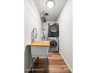 Single Level Living and no HOA in this brick, single family pool on Blue Cypress Golf Club in Florida - for sale on GolfHomes.com, golf home, golf lot