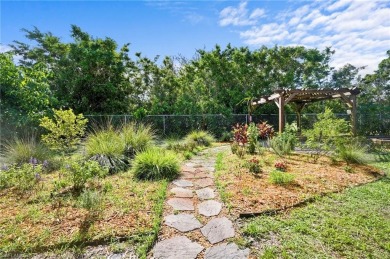 Welcome to this inviting 3-bedroom, 2-bathroom single-family on Estero Country Club in Florida - for sale on GolfHomes.com, golf home, golf lot