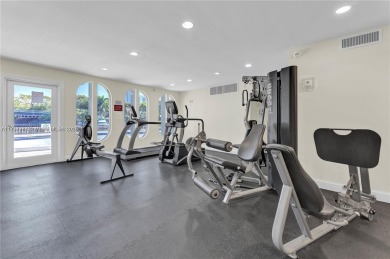 EXCELLENT LOCATION THIS LOVELY CONDO IS  READY TO MOVE IN * on The Diplomat Golf Resort and Spa in Florida - for sale on GolfHomes.com, golf home, golf lot