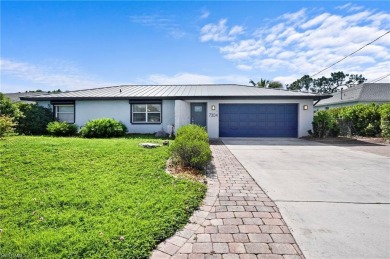 Welcome to this inviting 3-bedroom, 2-bathroom single-family on Estero Country Club in Florida - for sale on GolfHomes.com, golf home, golf lot