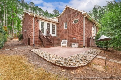 Charming all-brick home located in the gated and golf community on Carolina Trace Country Club in North Carolina - for sale on GolfHomes.com, golf home, golf lot