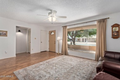 Great floorplan to this spacious  furnished 2 bedroom 1.75 bath on Fountain of the Sun Country Club in Arizona - for sale on GolfHomes.com, golf home, golf lot