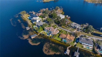 Spectacular lakefront, new construction in Bay Point, a private on Arnold Palmers Bay Hill Club and Lodge  in Florida - for sale on GolfHomes.com, golf home, golf lot