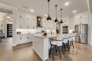 Welcome to this stunning custom-built single-story home on The Golf Club at Resort Eagle Mountain Lake in Texas - for sale on GolfHomes.com, golf home, golf lot