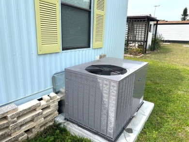 Discover this beautifully updated 2-bedroom, 2-bathroom home on Crystal Lake Club in Florida - for sale on GolfHomes.com, golf home, golf lot