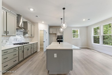 Welcome to your ideal golf and coastal retreat! This beautiful 2 on Brunswick Plantation and Golf Resorts in North Carolina - for sale on GolfHomes.com, golf home, golf lot