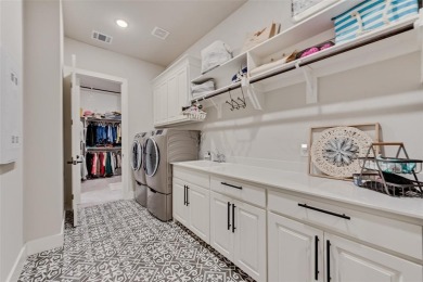 Welcome to this stunning custom-built single-story home on The Golf Club at Resort Eagle Mountain Lake in Texas - for sale on GolfHomes.com, golf home, golf lot