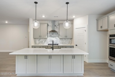 Welcome to your ideal golf and coastal retreat! This beautiful 2 on Brunswick Plantation and Golf Resorts in North Carolina - for sale on GolfHomes.com, golf home, golf lot