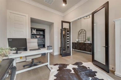Welcome to this stunning custom-built single-story home on The Golf Club at Resort Eagle Mountain Lake in Texas - for sale on GolfHomes.com, golf home, golf lot