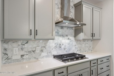 Welcome to your ideal golf and coastal retreat! This beautiful 2 on Brunswick Plantation and Golf Resorts in North Carolina - for sale on GolfHomes.com, golf home, golf lot