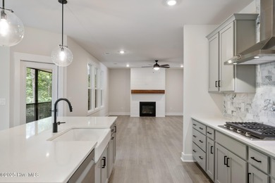 Welcome to your ideal golf and coastal retreat! This beautiful 2 on Brunswick Plantation and Golf Resorts in North Carolina - for sale on GolfHomes.com, golf home, golf lot