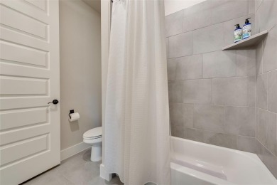 Welcome to this stunning custom-built single-story home on The Golf Club at Resort Eagle Mountain Lake in Texas - for sale on GolfHomes.com, golf home, golf lot