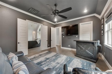 Welcome to this stunning custom-built single-story home on The Golf Club at Resort Eagle Mountain Lake in Texas - for sale on GolfHomes.com, golf home, golf lot